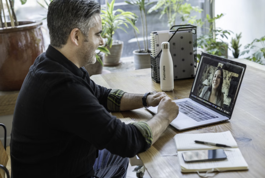 A man video chats with a person